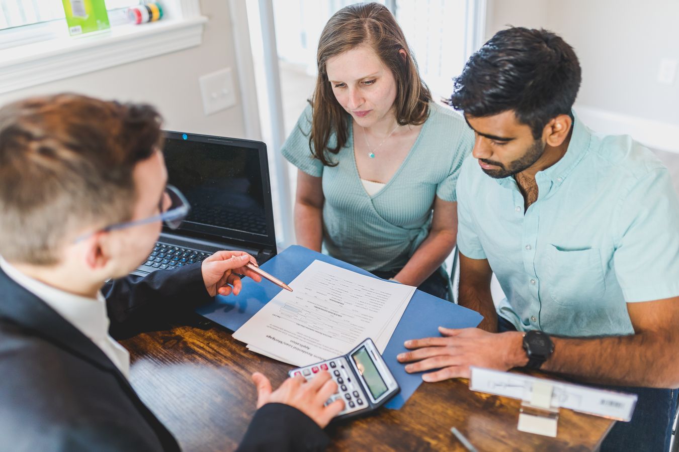 Real estate advisor meeting with clients